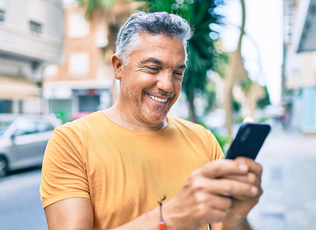 Man looking at a phone screen